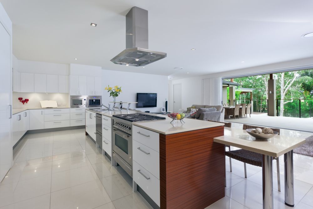 Modern White Kitchen With Island, Stainless Appliances — Country To Coast Building Contractors In Nambour, QLD