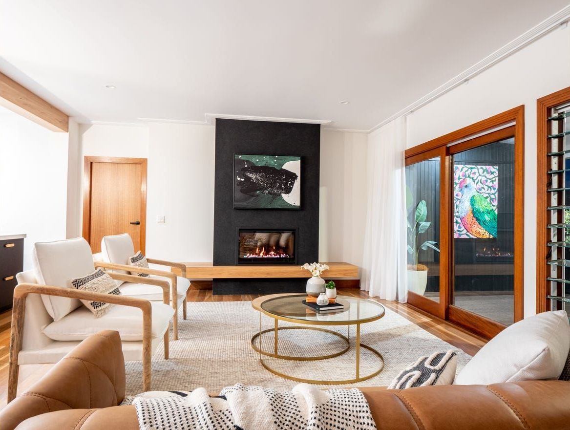 A Living Room With A Couch And Chairs — Country To Coast Building Contractors In Landsborough, QLD