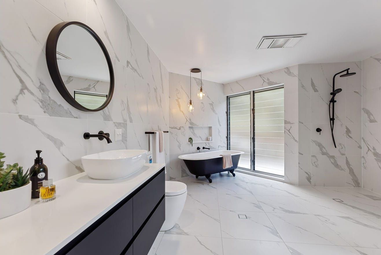 A Bathroom With A Tub And Sink — Country To Coast Building Contractors In Landsborough, QLD