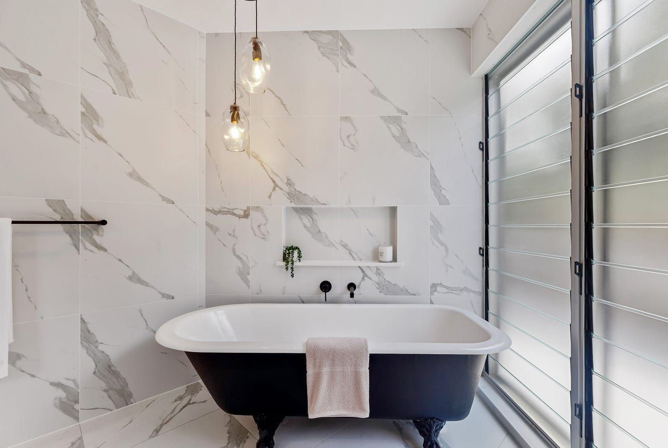 A Bathroom With A Bathtub And A Window — Country To Coast Building Contractors In Landsborough, QLD