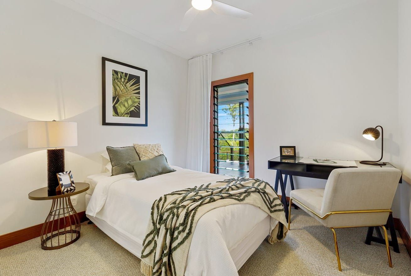 A Bedroom With A Large Bed — Country To Coast Building Contractors In Landsborough, QLD