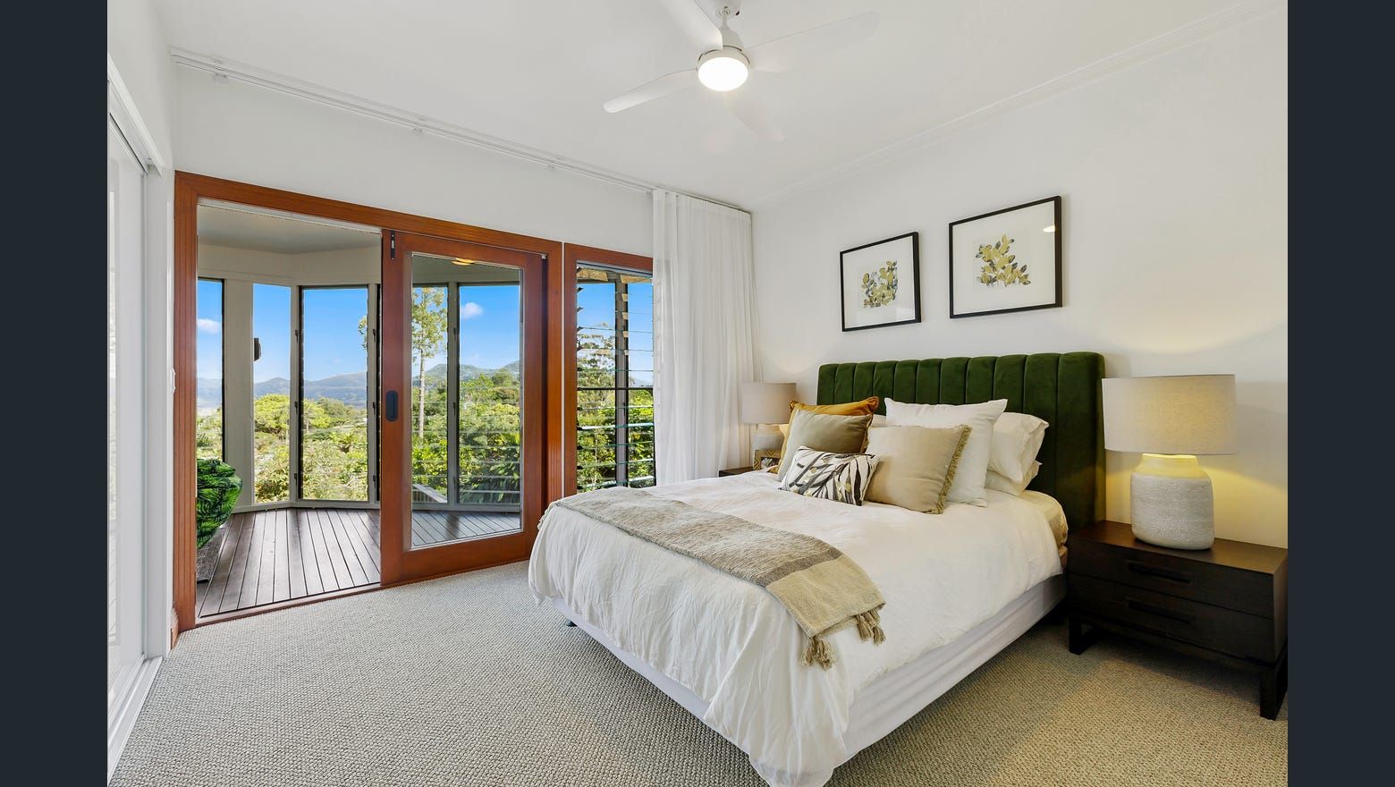 A Bedroom With A Large Bed — Country To Coast Building Contractors In Landsborough, QLD