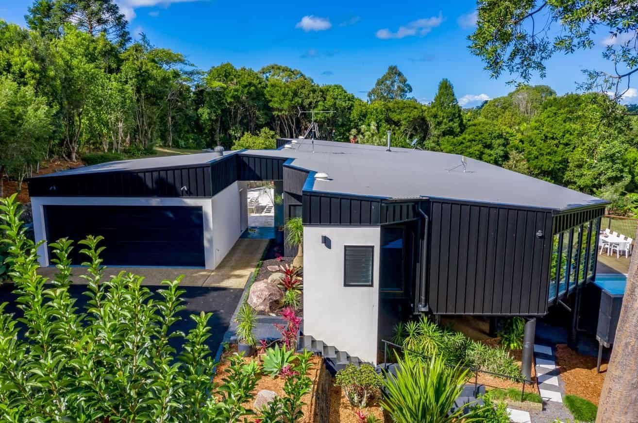 An Aerial View Of A Modern House Surrounded By Trees — Country To Coast Building Contractors In Landsborough, QLD