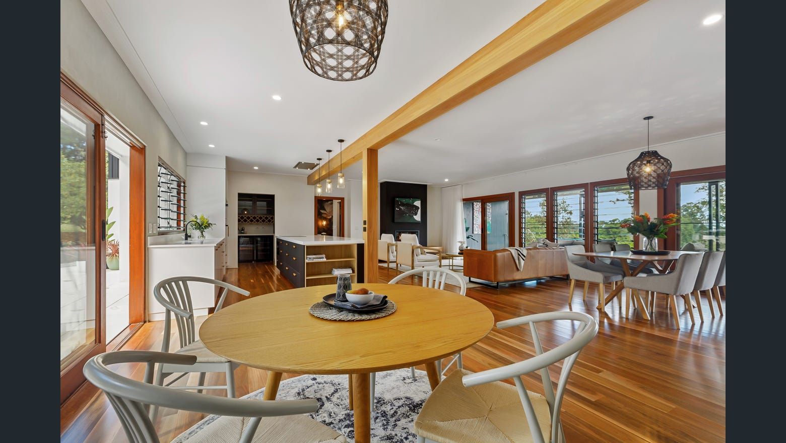There Is A Table And Chairs In The Middle Of The Room — Country To Coast Building Contractors In Noosa, QLD