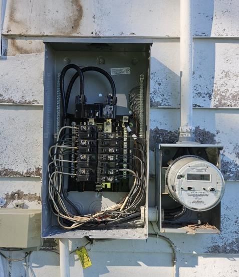 a person is holding a circuit breaker 