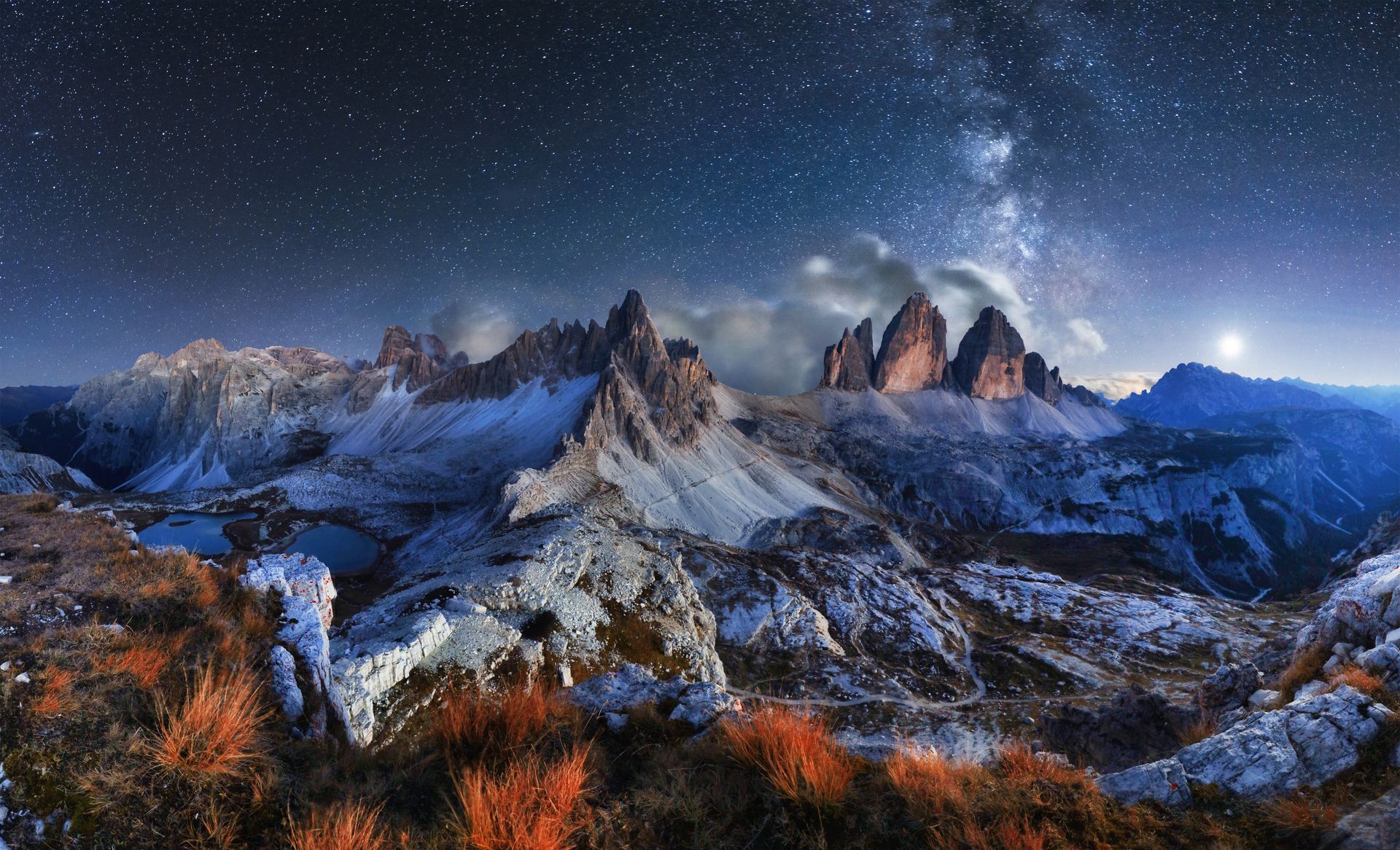 Starry night atop mountain range
