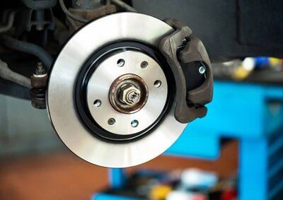 Brand new brake disc on car — Brake Services in Denton, Texas