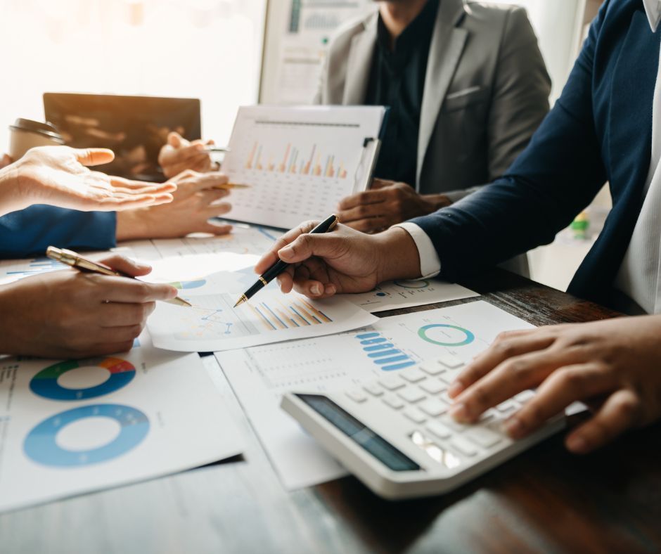 Business owner reviewing fine print in a commercial contract during annual legal review