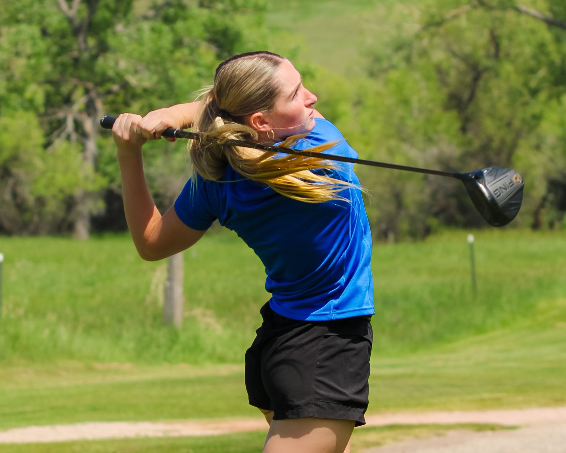Young golfer practicing swing at Casper Country Club
