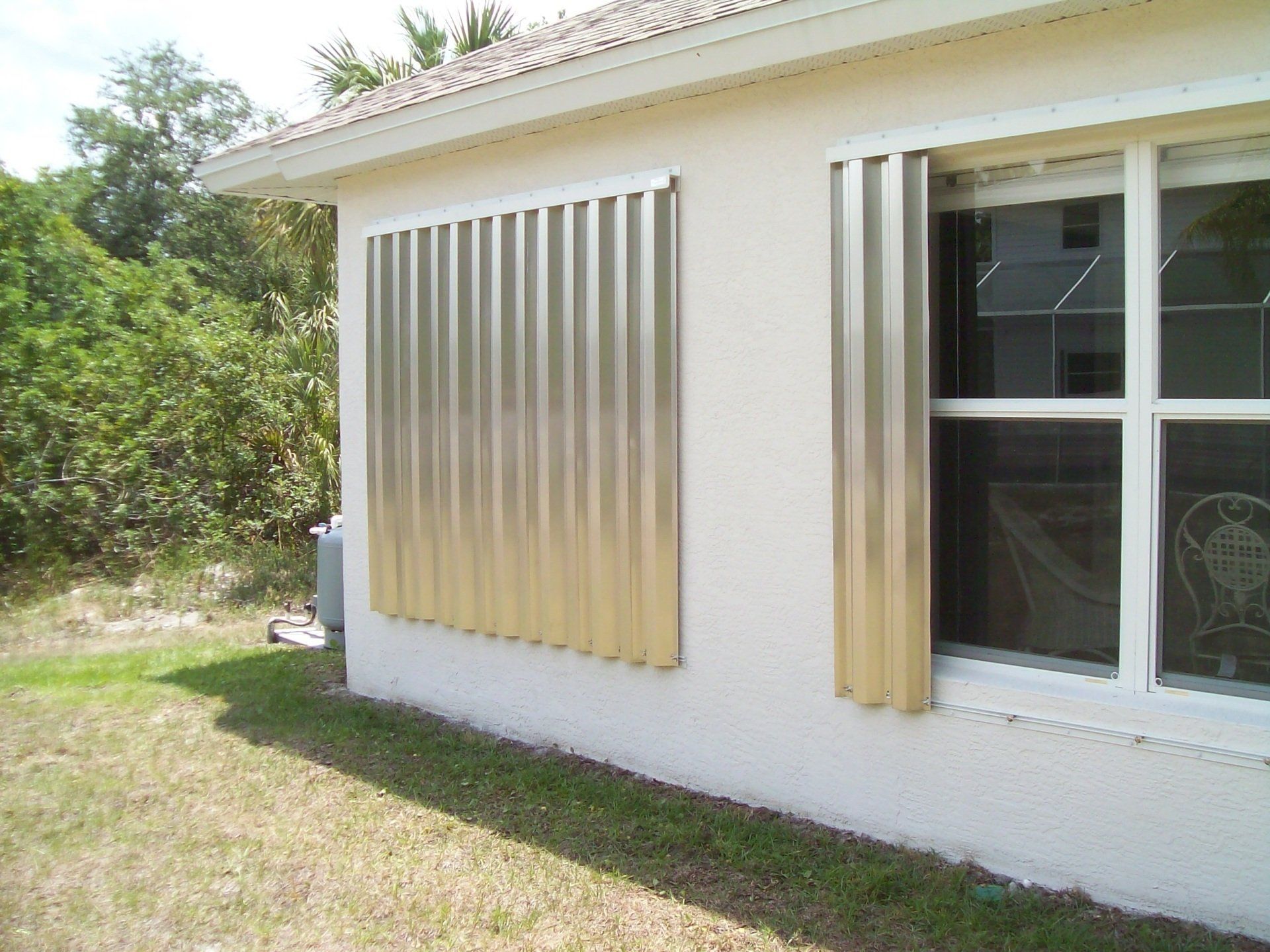 Metal Panel When Opened And Closed — Reliable Shutter Co., Inc. — Venice, Florida