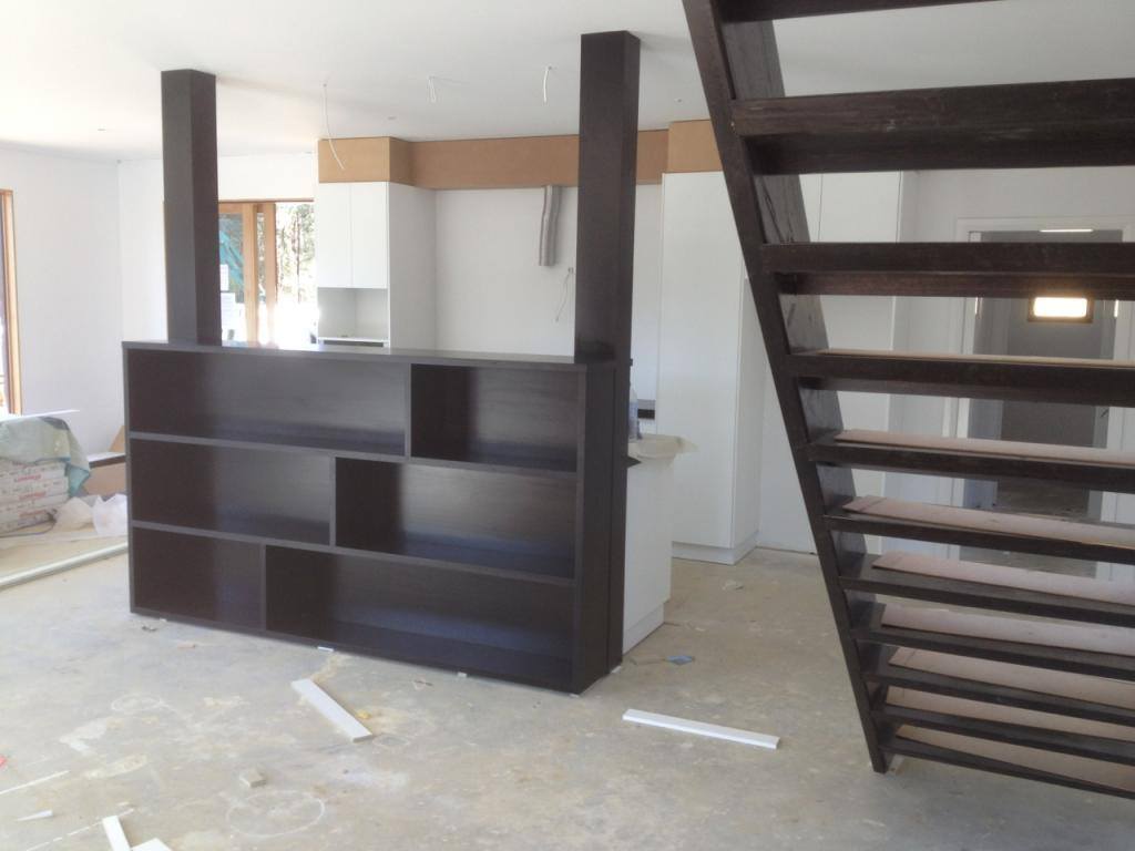 black shelves and staircase