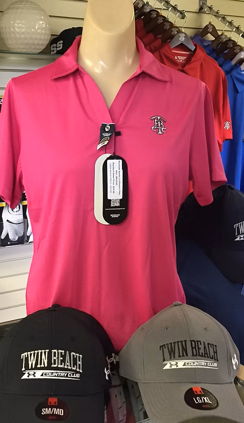 Pink polo shirt on a mannequin with