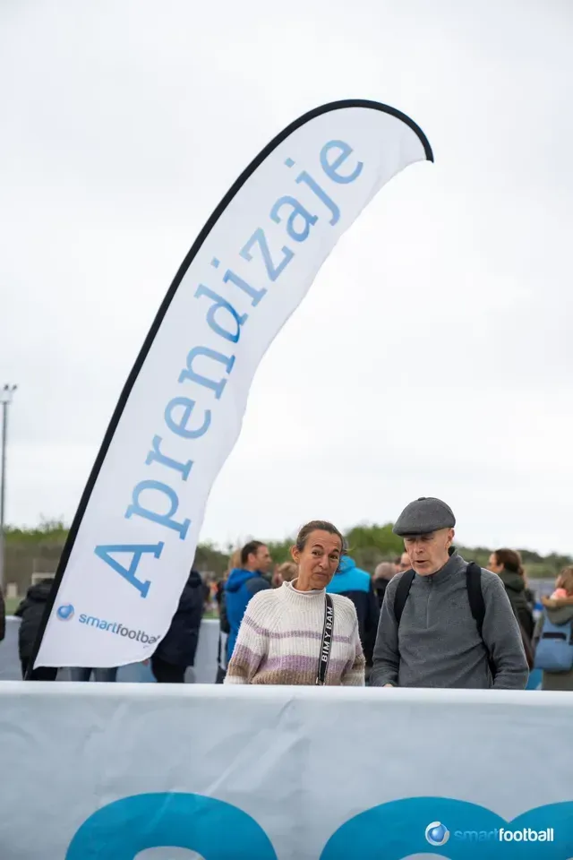 People near a flag that says 
