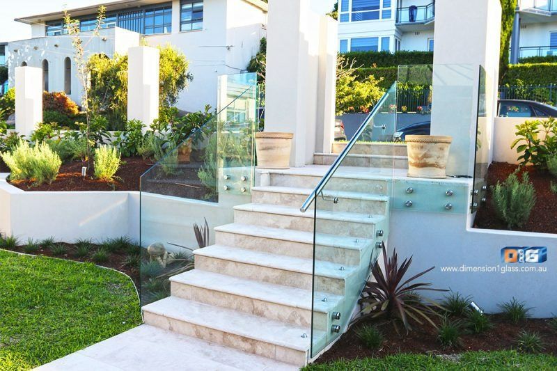 A Set Of Stairs With A Glass Railing In Front Of A House — Dimension One Glass Fencing In Central Coast, NSW