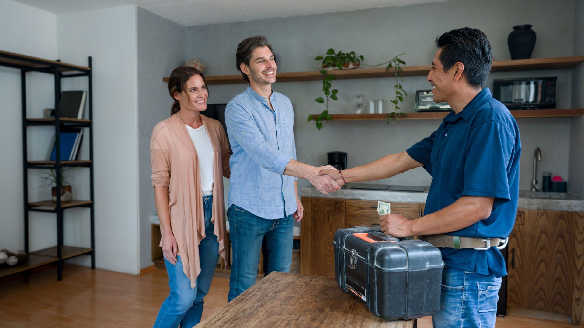 Plumber Handshake with Client — Bartlesville, OK — Mason's Plumbing