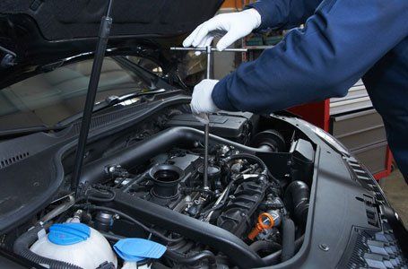vehicle engine repair by a mechanic