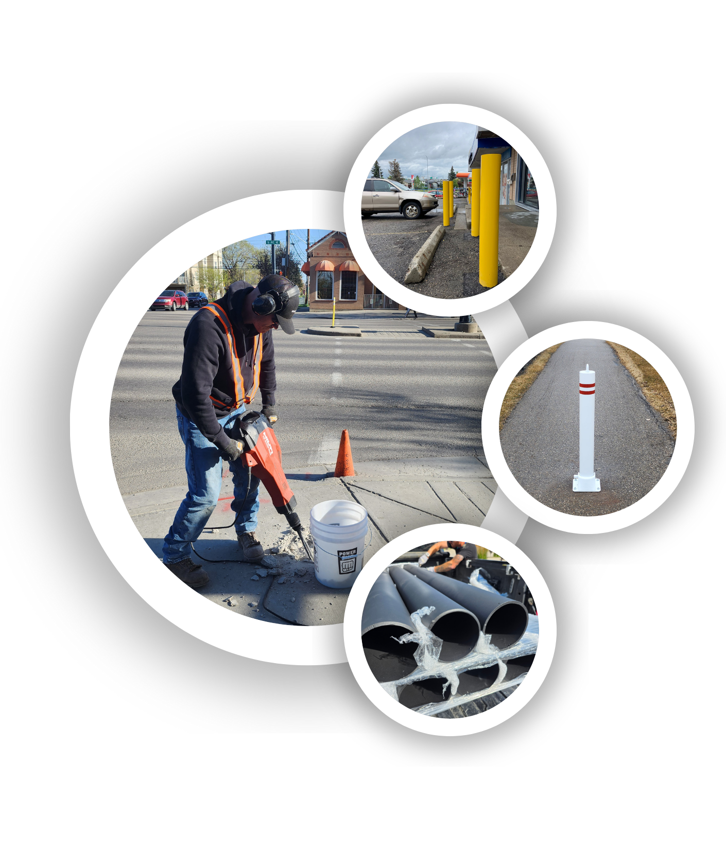 A construction worker is smiling with his arms crossed and wearing a hard hat.