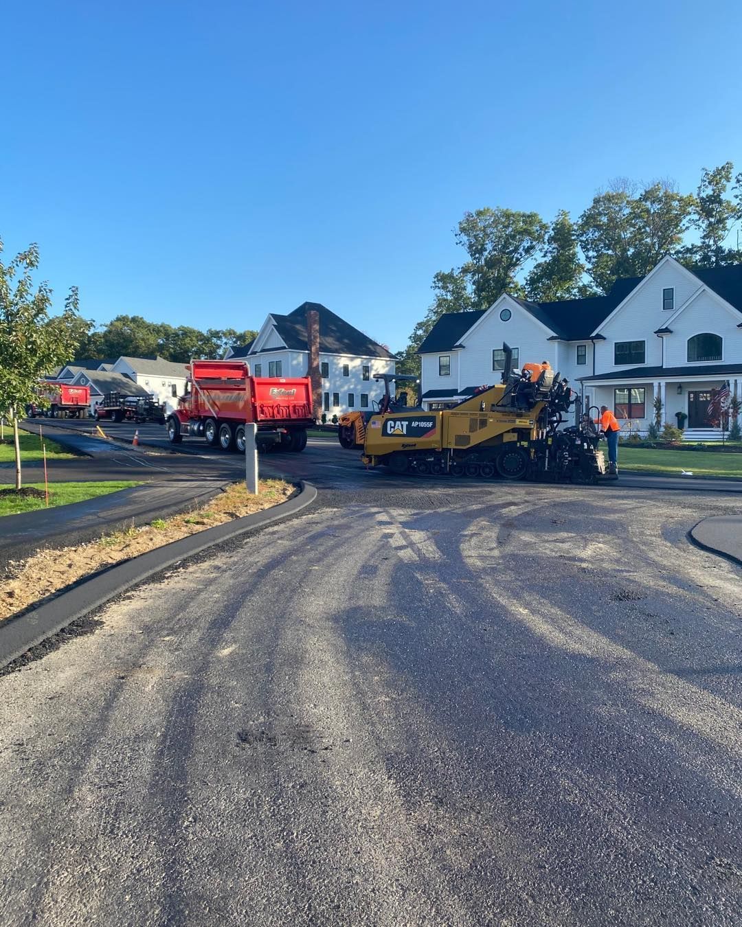 A road is being paved in a residential area
