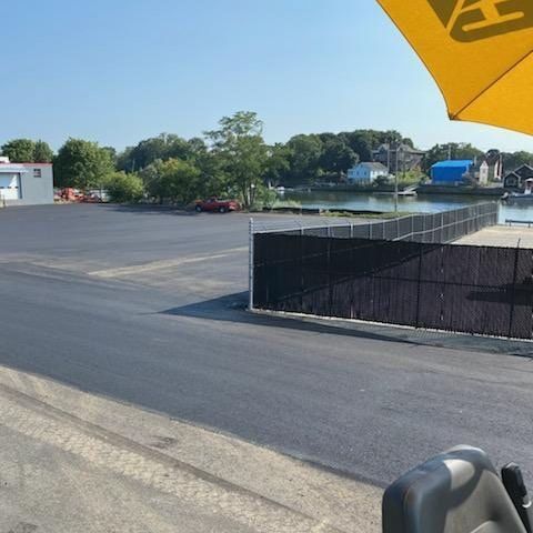 A yellow umbrella with the letter a on it