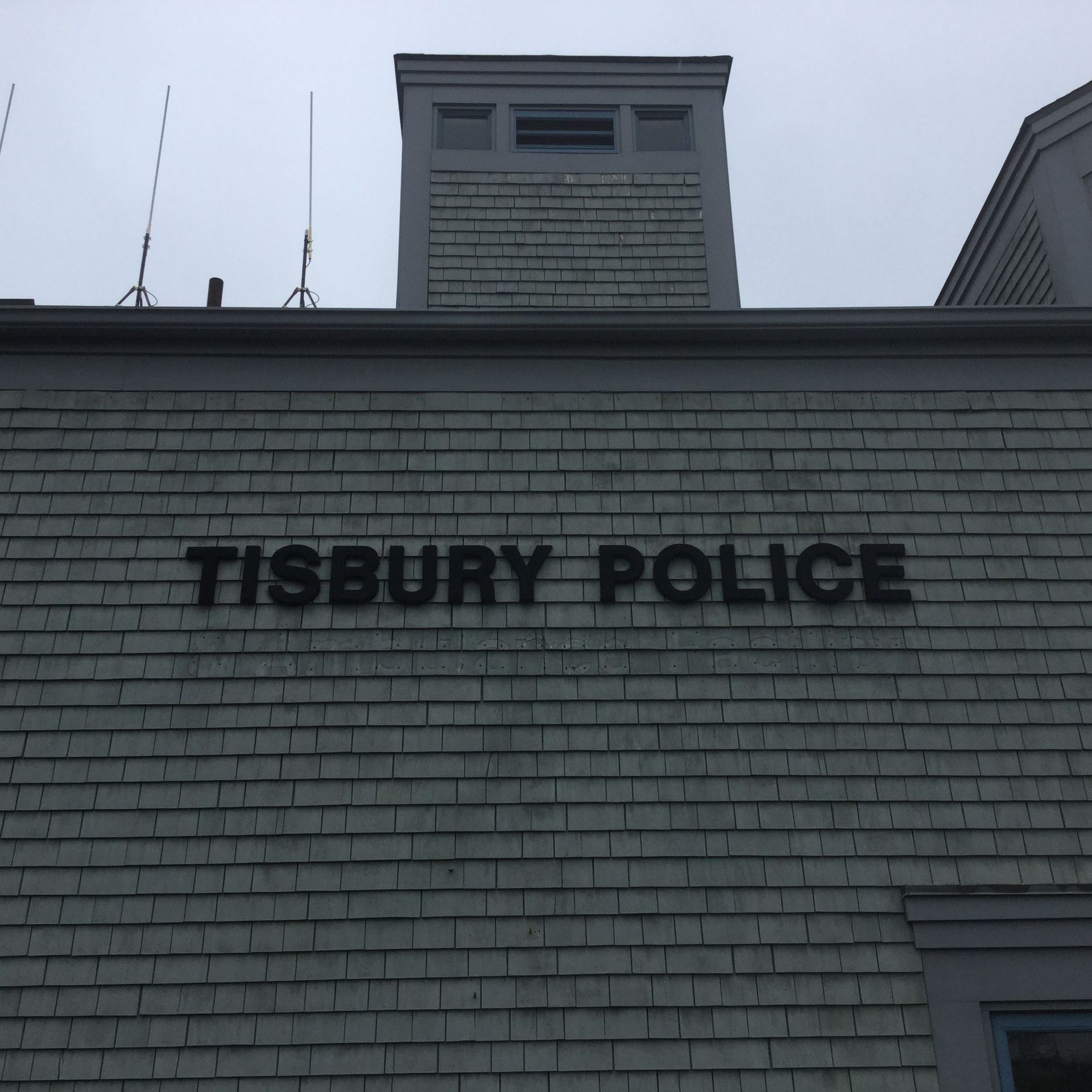A brick building with the words tisbury police on it