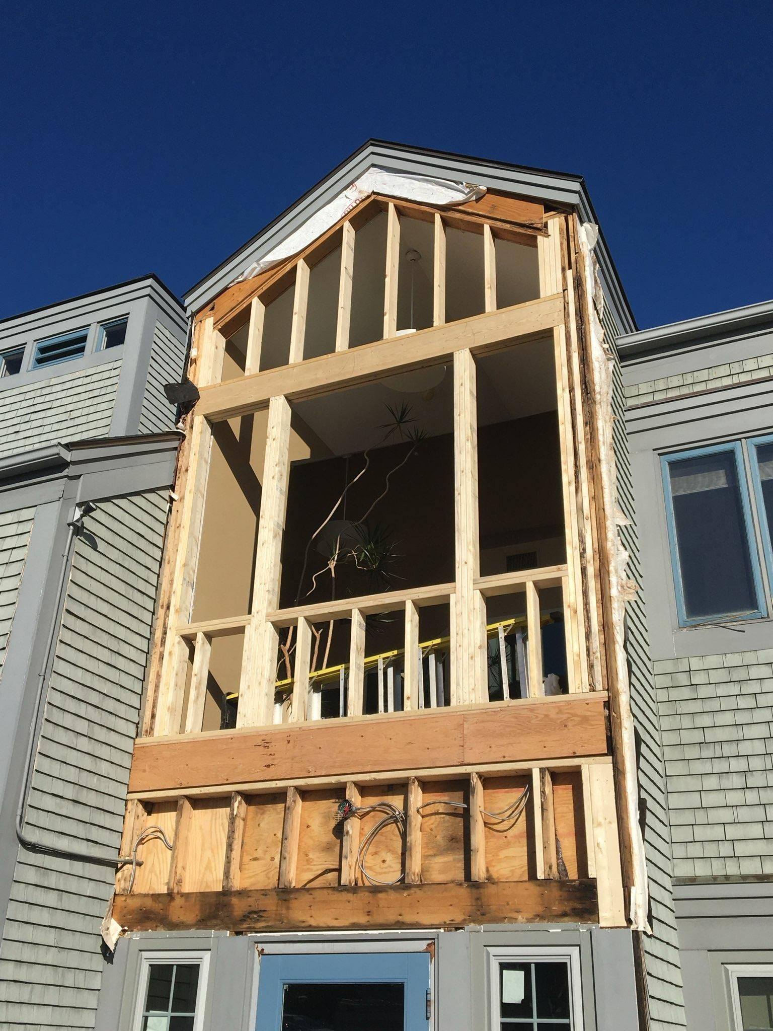 A building with a balcony that is being built