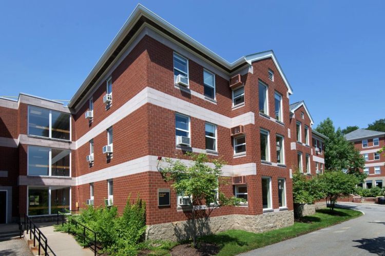 A large brick building with a lot of windows
