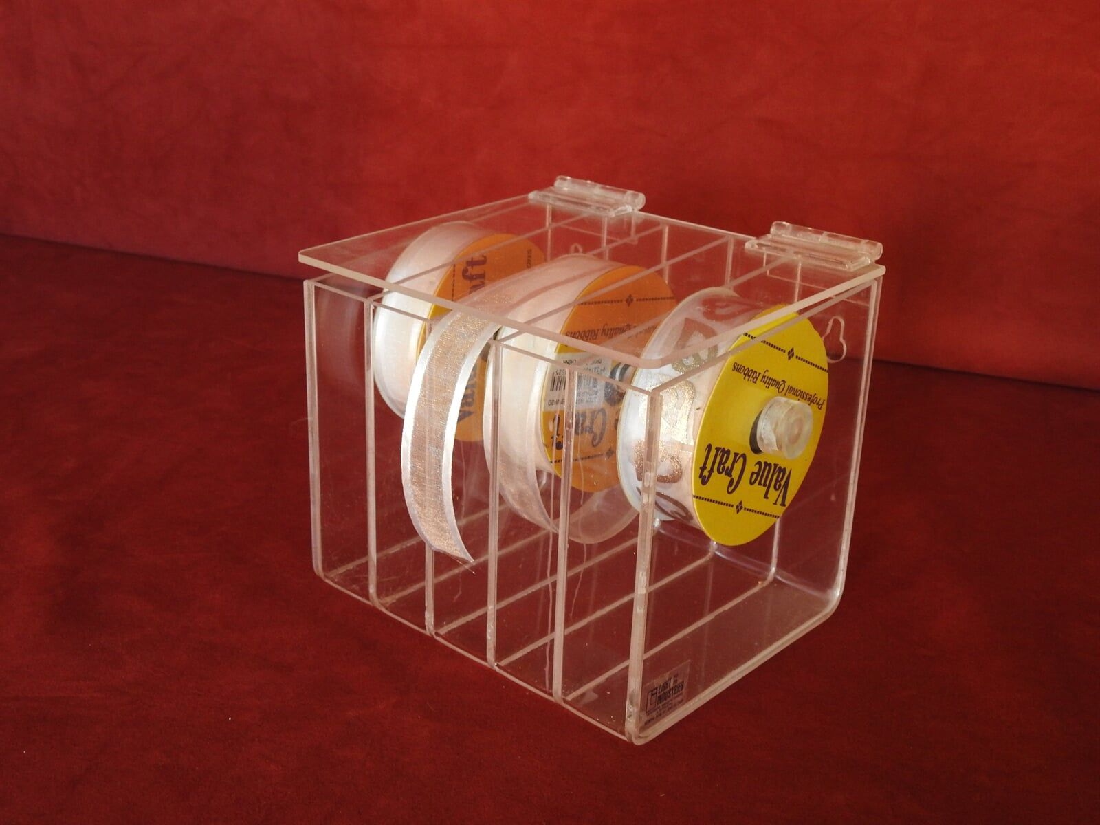 A Clear Acrylic Container With Three Rolls Of Tape — Light Industries in Bowral, NSW