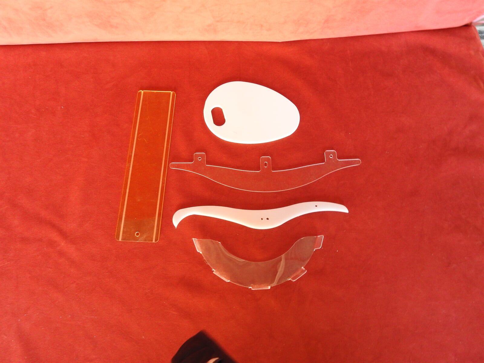 A Red Cloth With A Smiley Face — Light Industries in Bowral, NSW