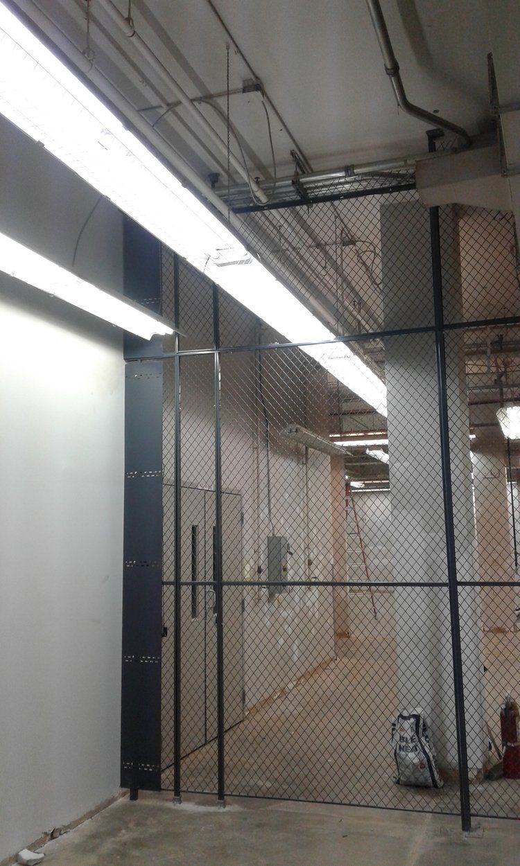 There is a fence in the middle of the room.