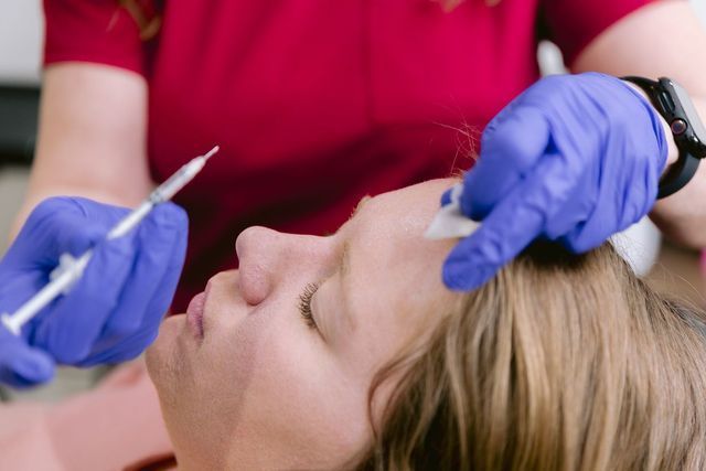 A Woman is Getting a Botox — Greenwood, IN — Vigor Health and Beauty