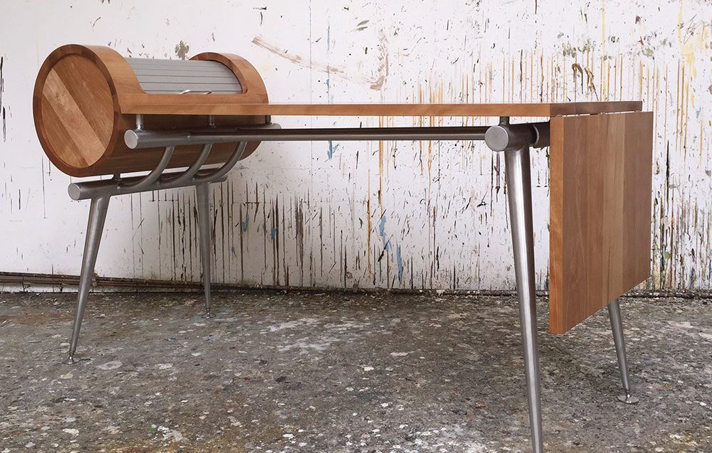 A designer wooden office table with a barrel on top of it