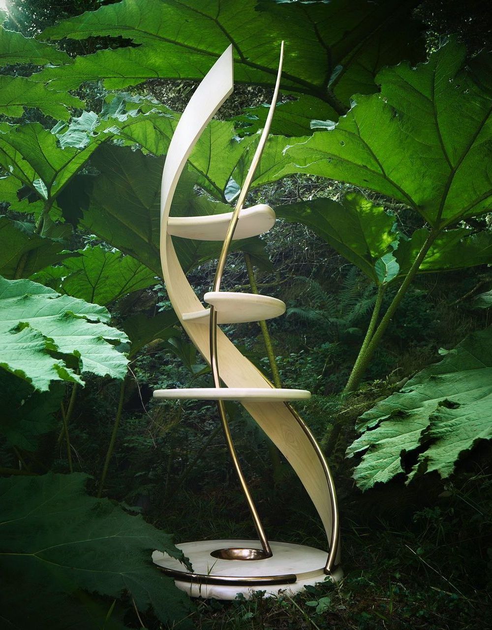 A  custom build sycamore sculpture in the middle of a forest designed by sebastian blakeley designs