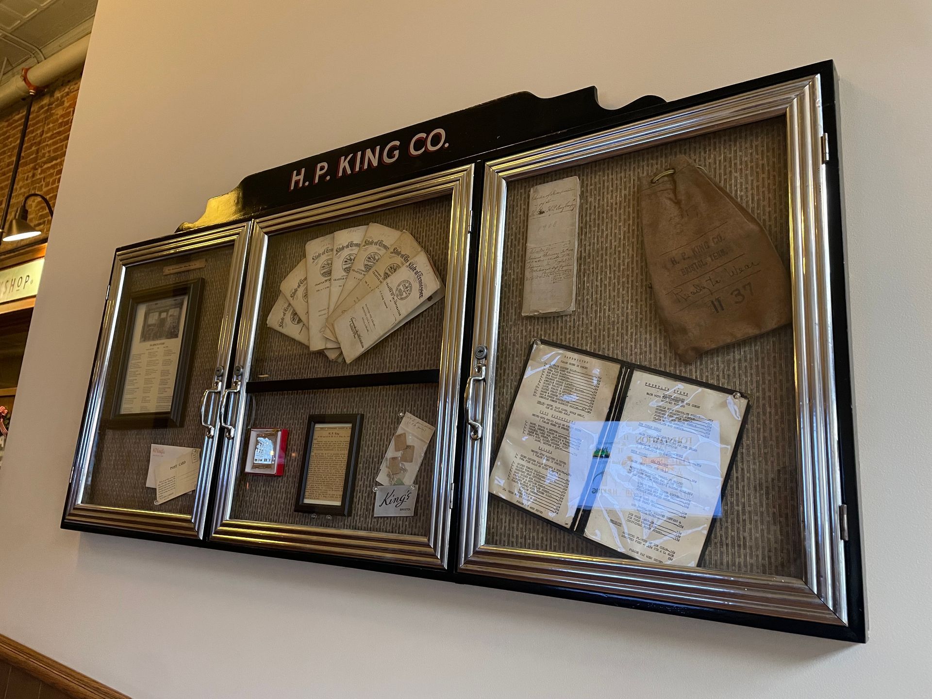 Historic HP King Memorabilia behind a cased viewing display