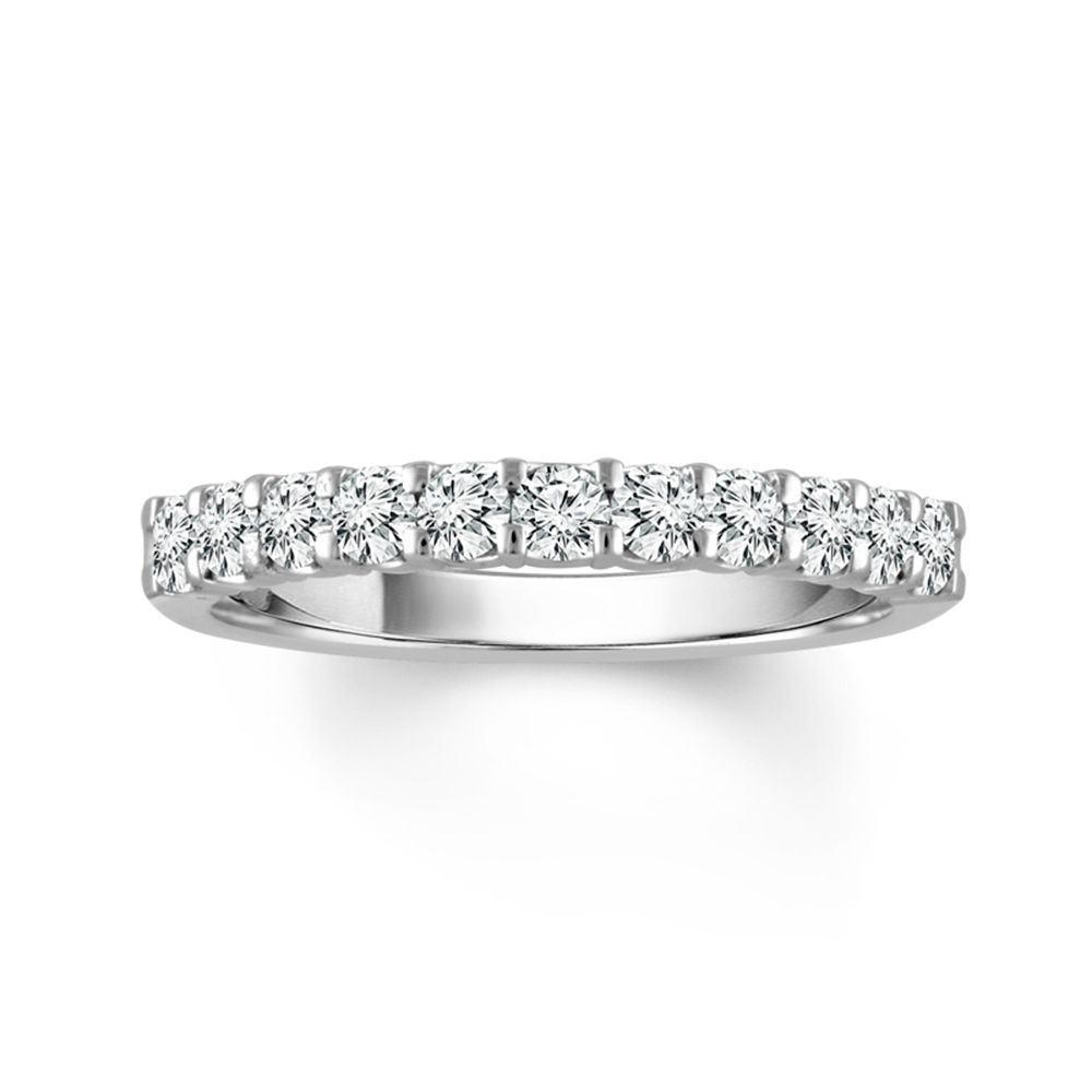 Silver diamond eternity ring on a white background