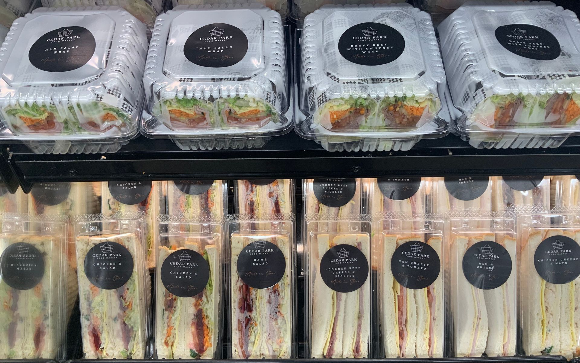 Clear Plastic Meal Containers and Sandwiches Stacked — Cedar Park Supermarket In Taranganba, QLD