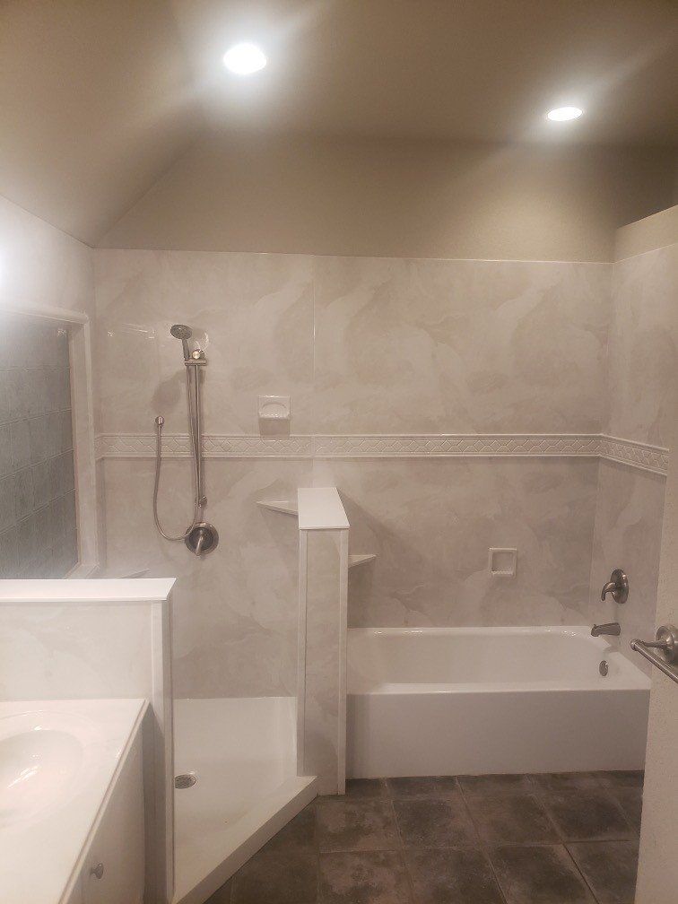 Travertine Walk In Shower and White Tub