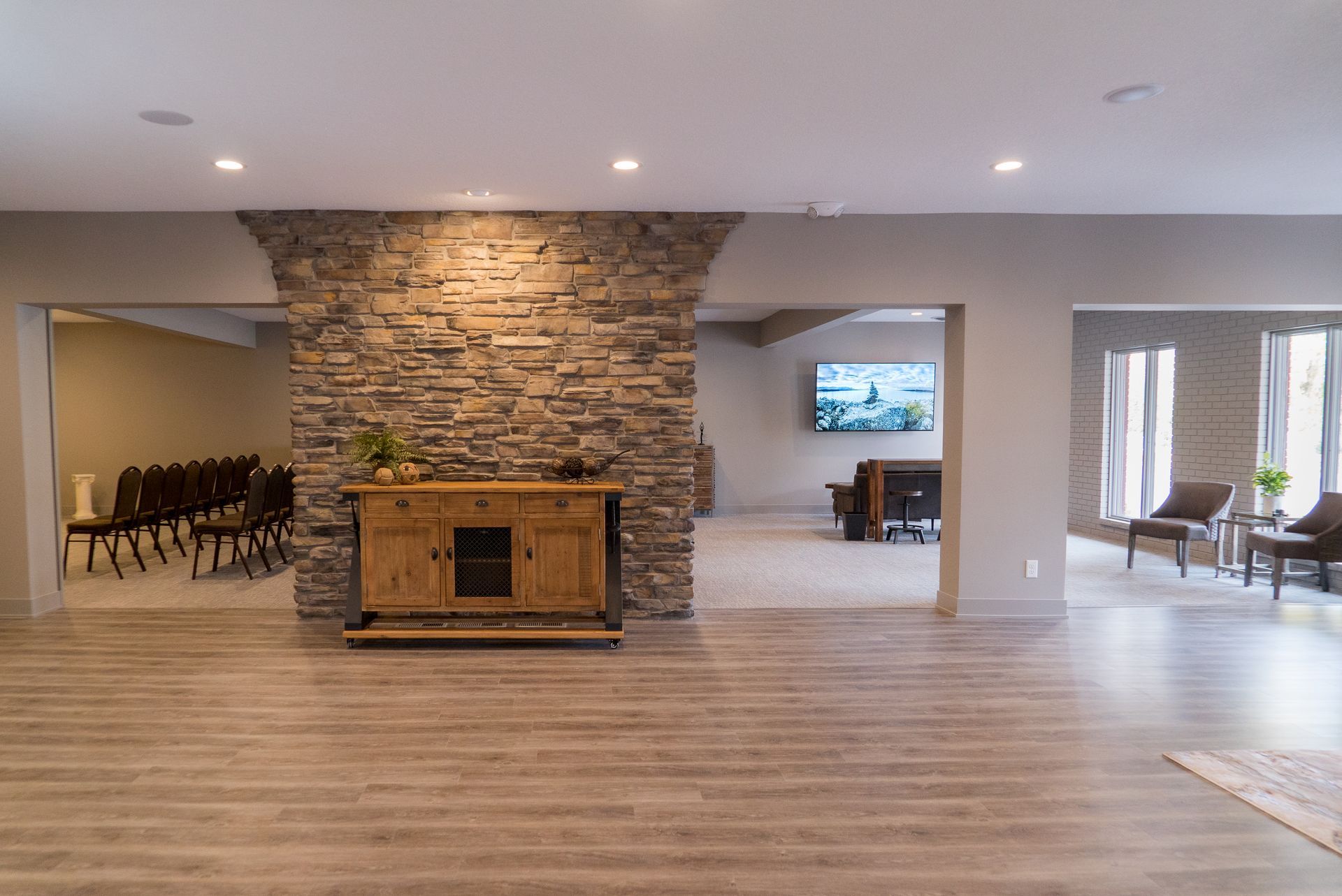 There is a fireplace in the middle of the room.