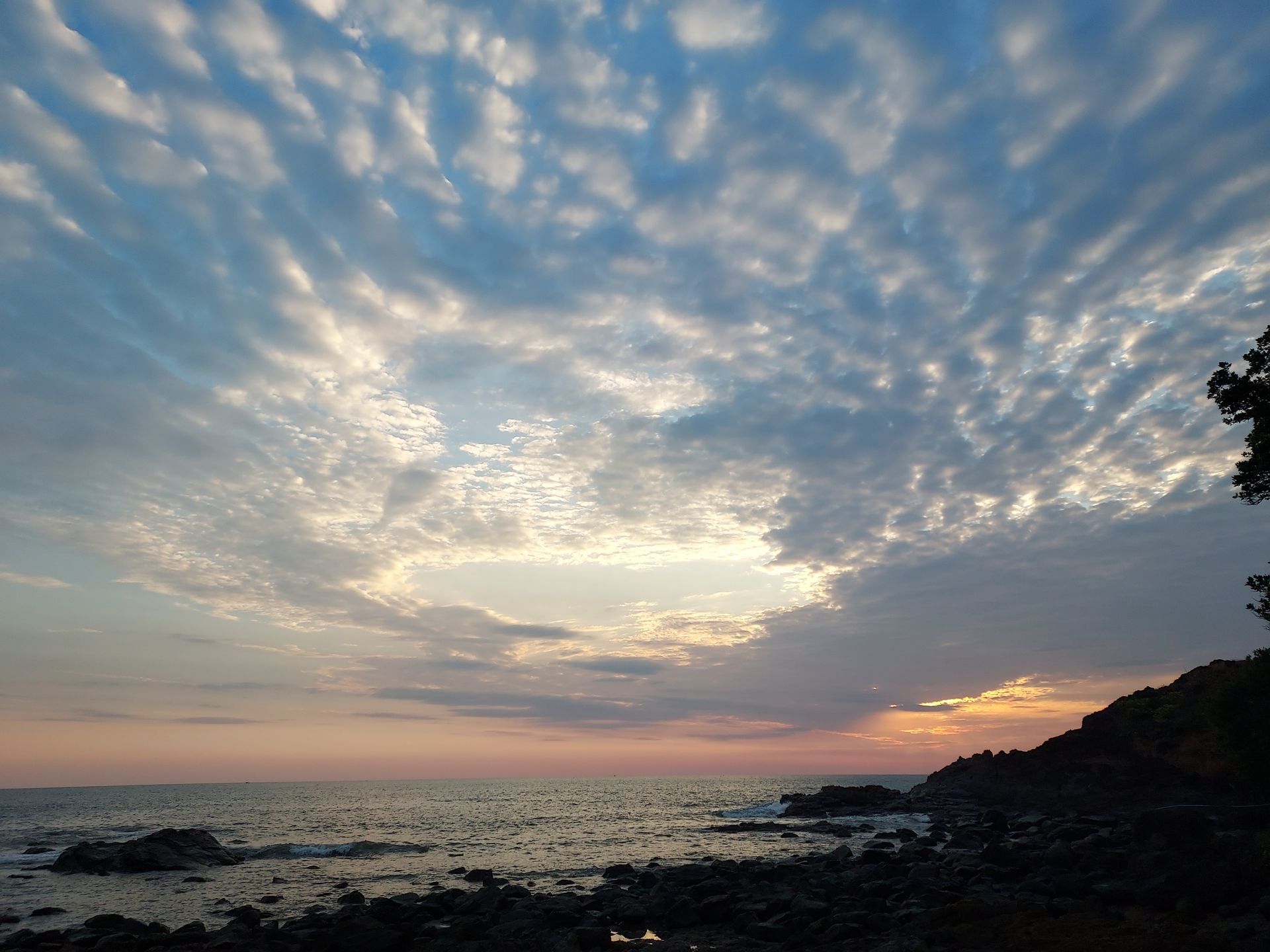 sunset at CLiff Cottage resort