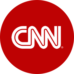 cnn logo in a red circle on a white background