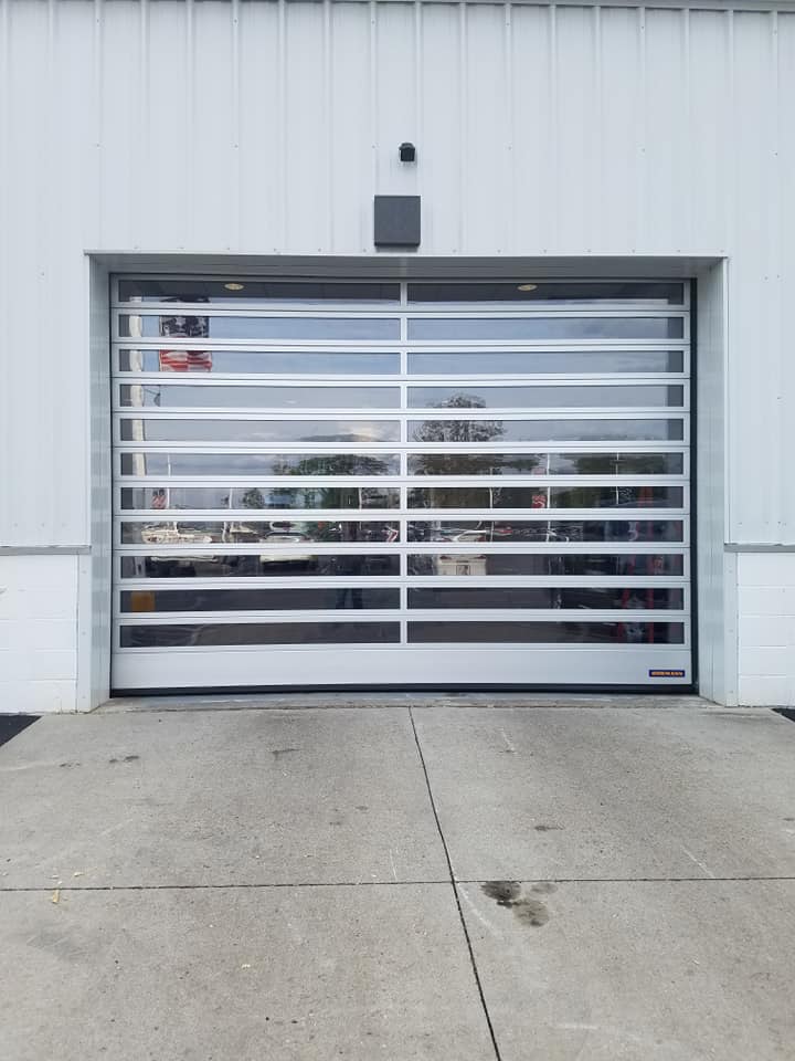 Glass Car Garage ─ Columbus, IN ─ Sterling Garage Doors, Inc