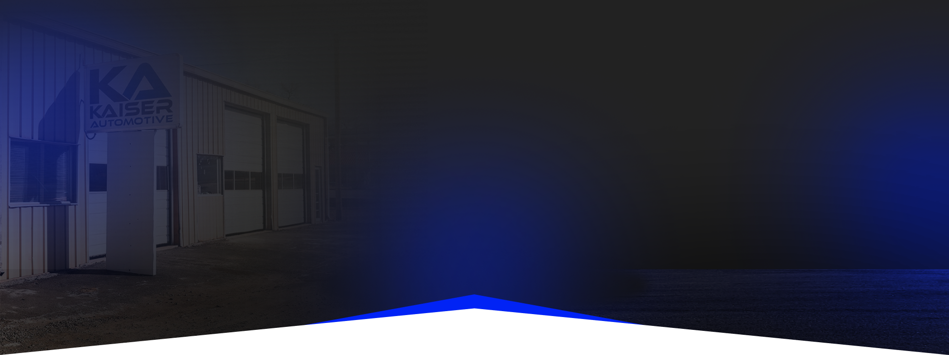 Exterior view of a building with a blue gradient and white bottom. The building's name is on the front.