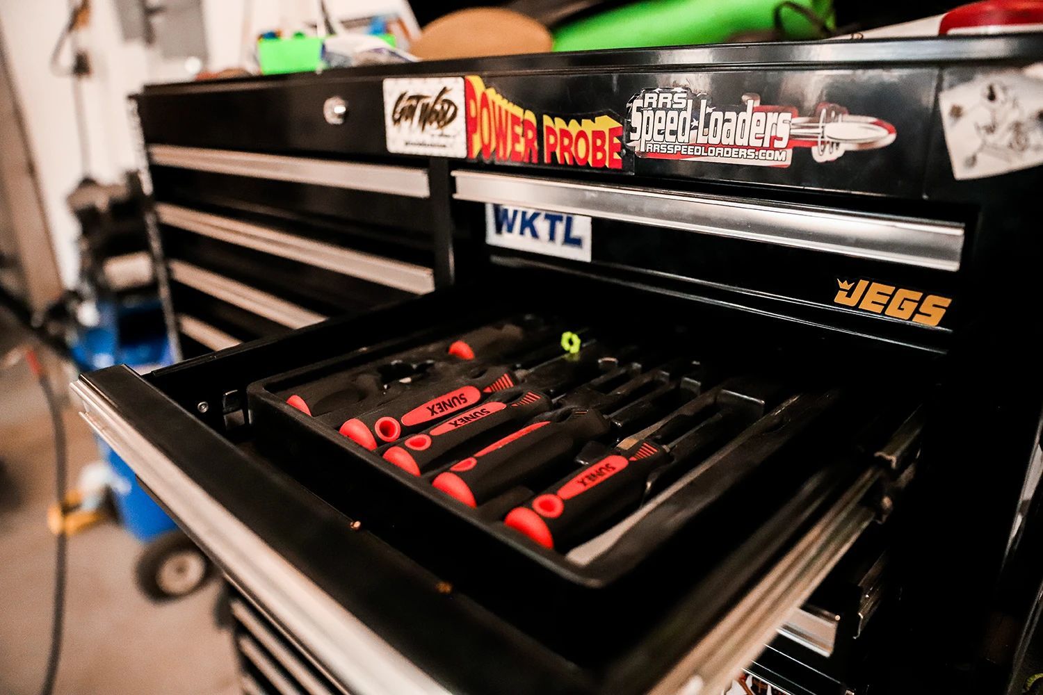 Open drawer of a black toolbox holding a set of screwdrivers | Kaiser Automotive
