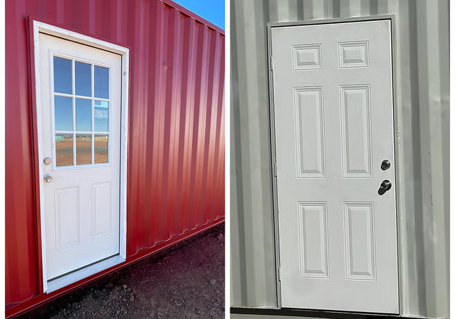 A red shipping container with a white door next to it.