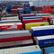 A bunch of shipping containers with one that says carrie european