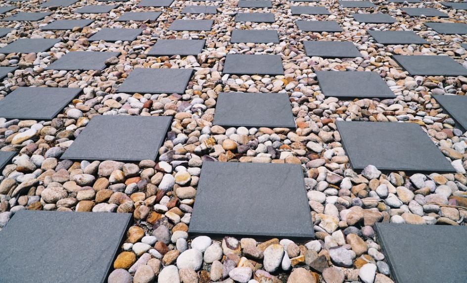A Row of Square Tiles Sitting on Top of A Pile of Rocks — S & L Sand & Gravel in Ballina, NSW