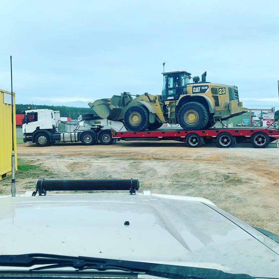 Trailer Carrying CAT Machine — S & L Sand & Gravel in South Lismore, NSW