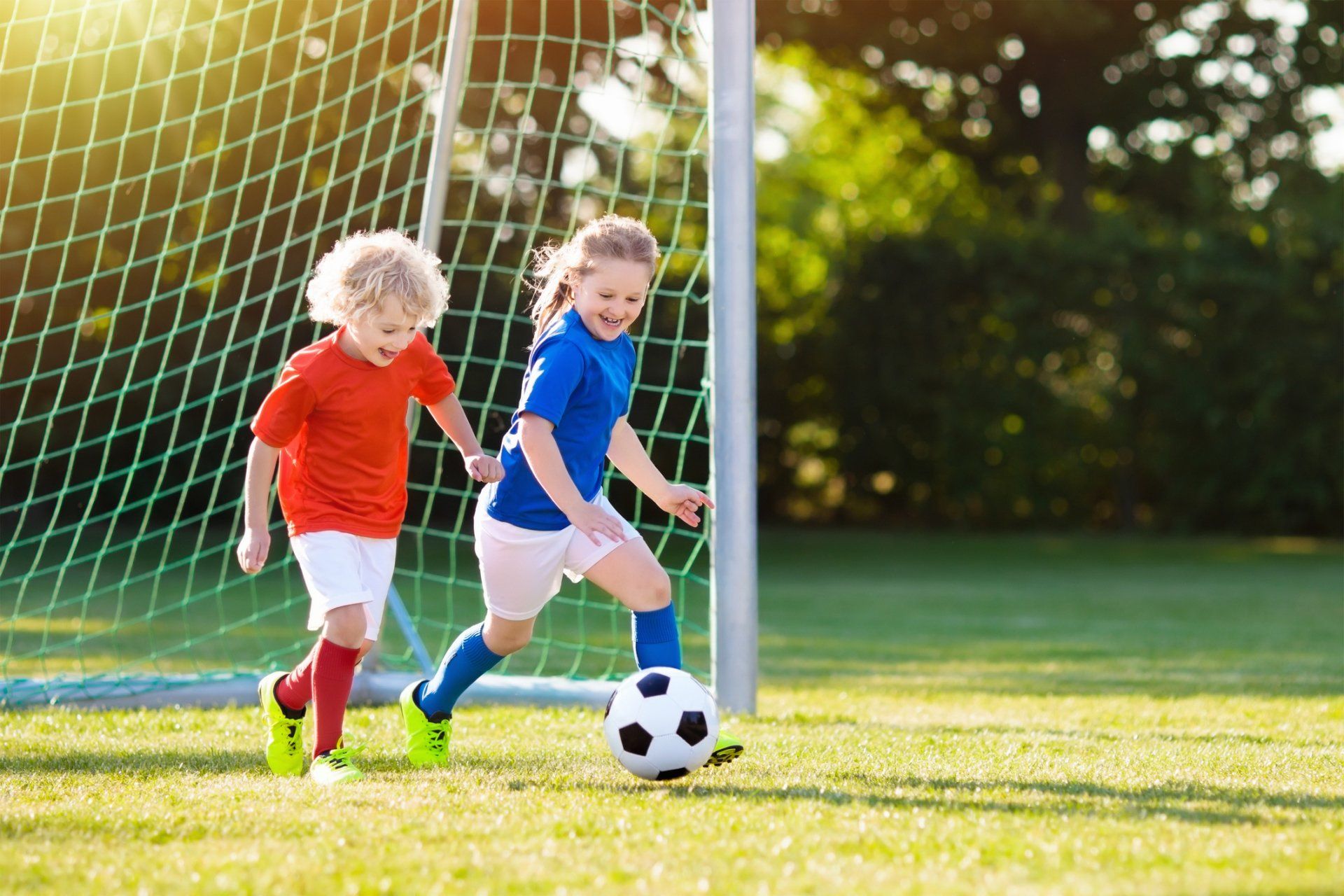 Kids playing soccer — Ashland Family Dentistry in Ashland and Ruther Glen, VA