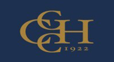 Gold “GH” monogram with “1922” beneath on a dark blue background