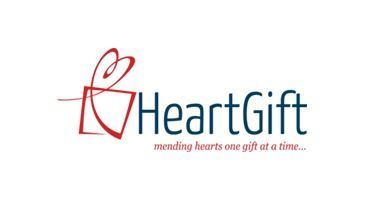 HeartGift logo with red heart and gift box icon and the tagline “mending hearts one gift at a time...”