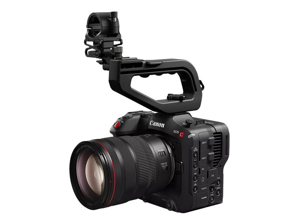 Black professional video camera with lens and top handle on a white background